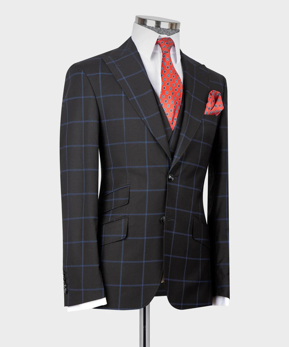 KOSS ATELIER dark blue three piece suit with windowpane pattern red tie and pocket square on mannequin