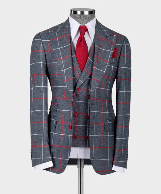 KOSS ATELIER grey and red windowpane 3 piece suit on mannequin with double breasted vest red tie and pocket square