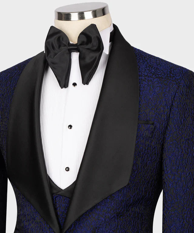 KOSS ATELIER navy blue embossed tuxedo jacket with black satin shawl lapel white pleated shirt and bow tie