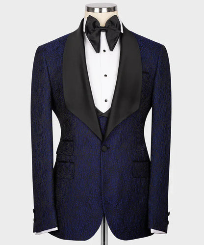 KOSS ATELIER navy blue embossed tuxedo jacket with black satin shawl lapel and bow tie on mannequin