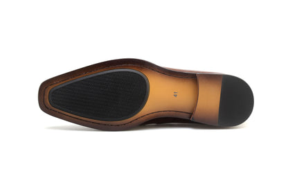 Sole view of premium brown loafer shoes showcasing sturdy construction and elegant design