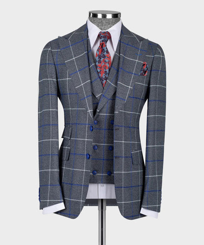 KOSS ATELIER grey and blue windowpane 3-piece suit on mannequin with double breasted vest white shirt red patterned tie