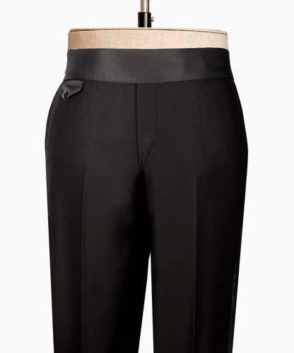 KOSS ATELIER handmade black and gold tuxedo trousers with satin waistband and side button tab on mannequin