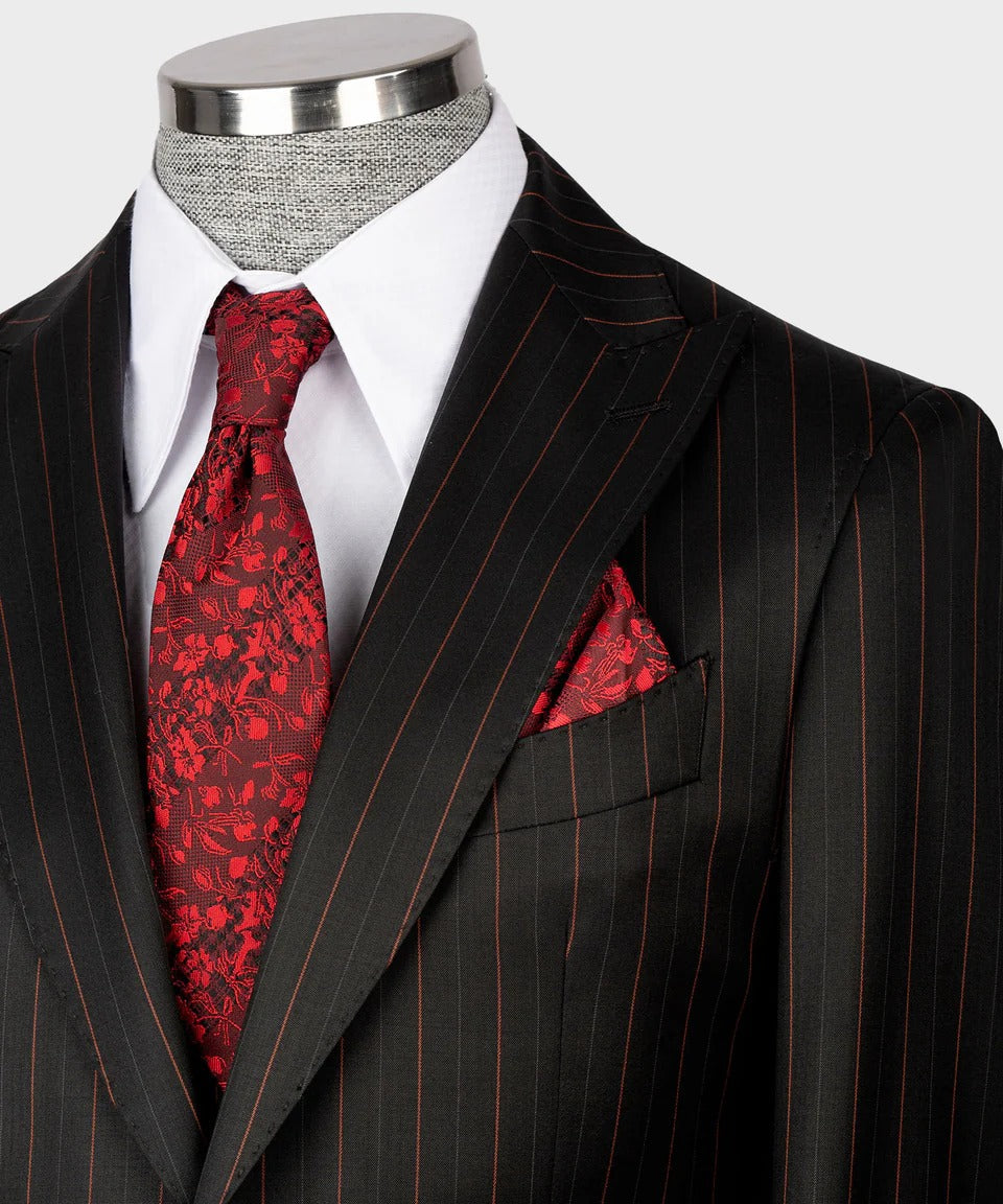 KOSS ATELIER black and red pinstripe suit on mannequin with white shirt red floral tie and pocket square