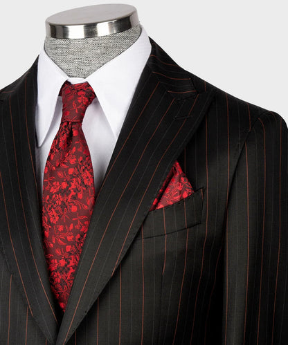 KOSS ATELIER black and red pinstripe suit on mannequin with white shirt red floral tie and pocket square