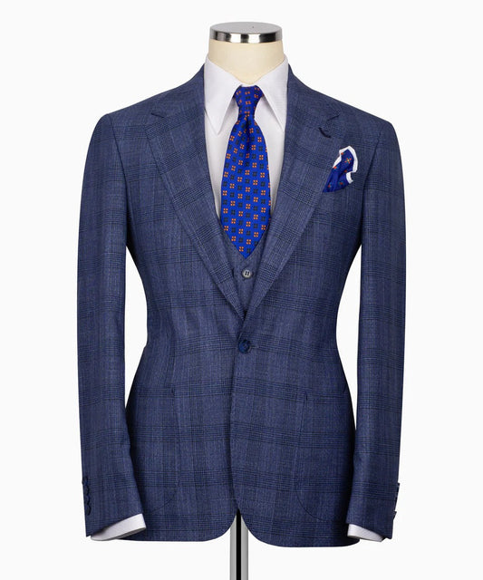 KOSS ATELIER blue glen plaid three piece suit on mannequin with white shirt blue patterned tie and pocket square