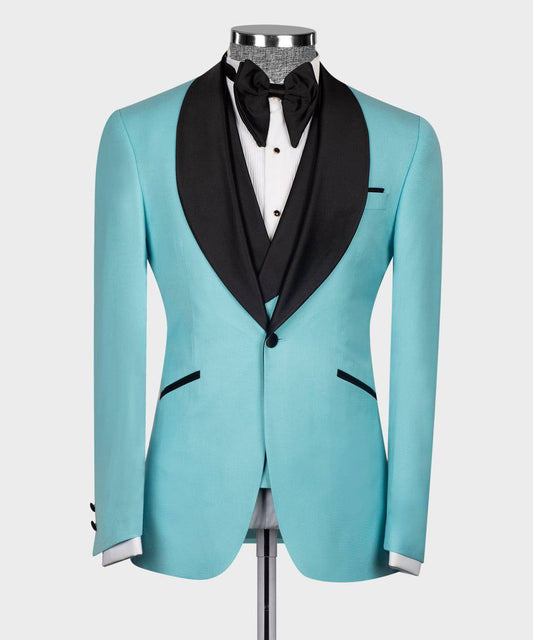 KOSS ATELIER Azure Noire Tuxedo featuring a light blue jacket with black lapels and matching bow tie